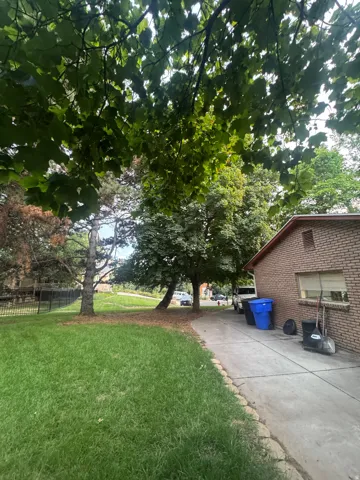 Brick exterior with an asphalt shingle roof