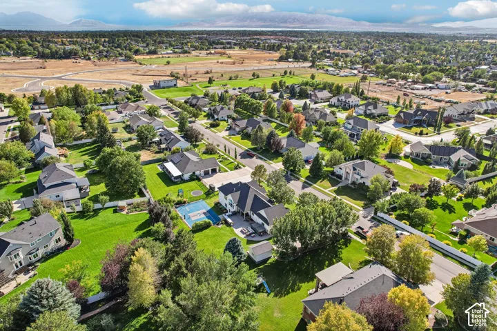 Expansive residential neighborhood with mature trees, established streets, and varied architectural styles