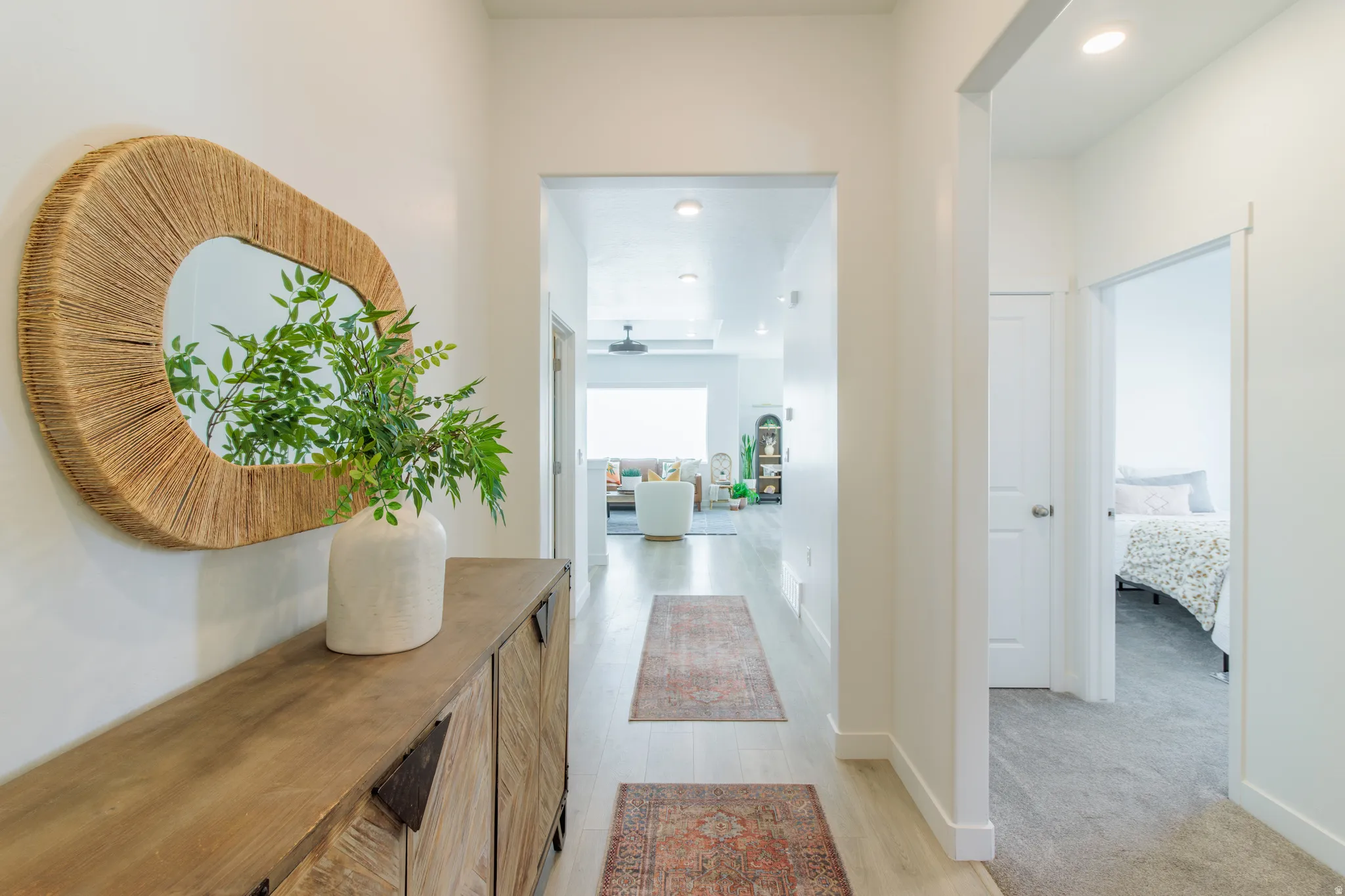 Bright hallway with light wood-finish flooring