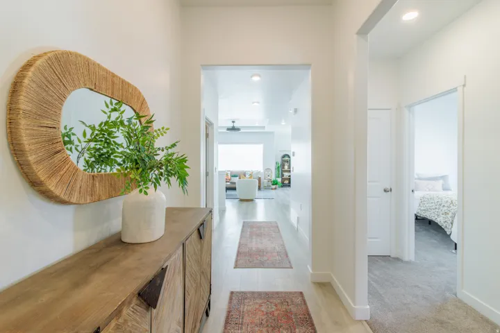 Bright hallway with light wood-finish flooring