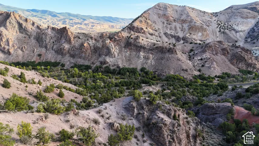 Mountainous landscape featuring varied terrain and natural vegetation