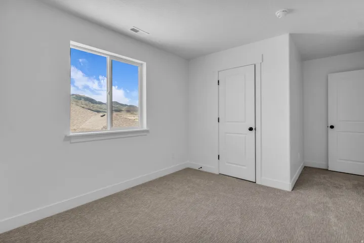 Bedroom #4 with walk-in closet.
