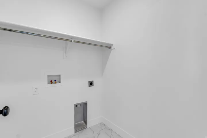 Full-size, dedicated laundry room with washer/dryer hookups.