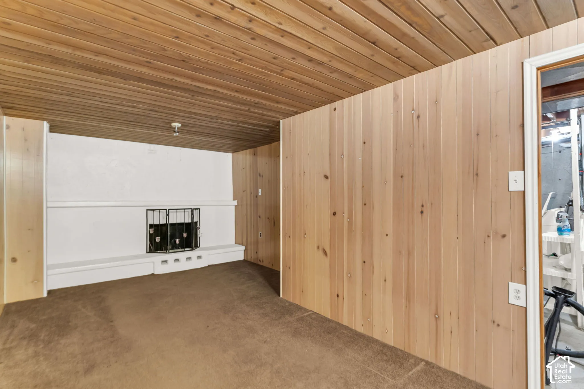 Wood-paneled walls and ceiling