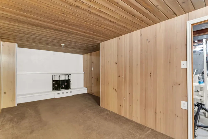 Wood-paneled walls and ceiling