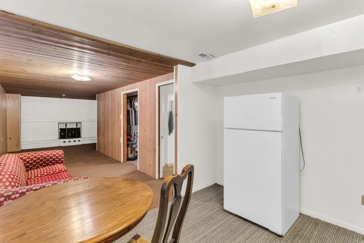 Wood-panel ceiling with recessed lighting