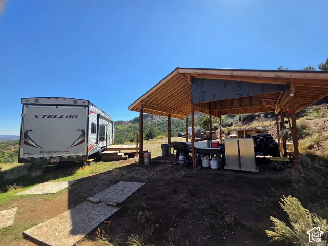 Detached covered gazebo, camper deck & wood shed included!!