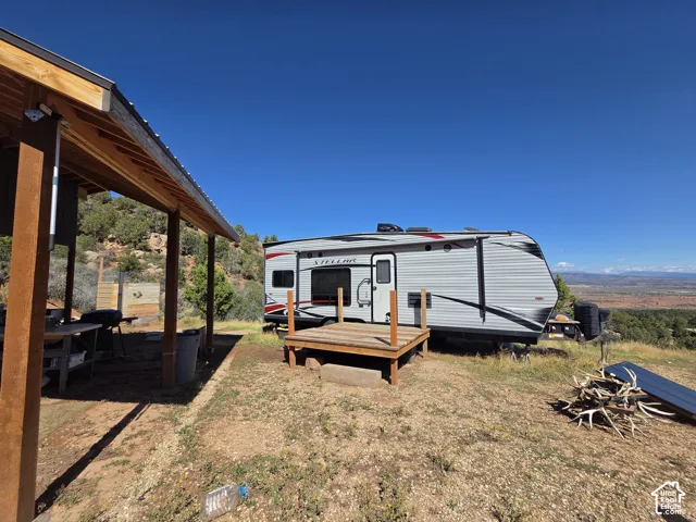 Detached covered gazebo, camper deck & wood shed included!!