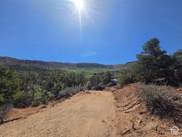 Nice flat areas excavated with road base for camping or building!
