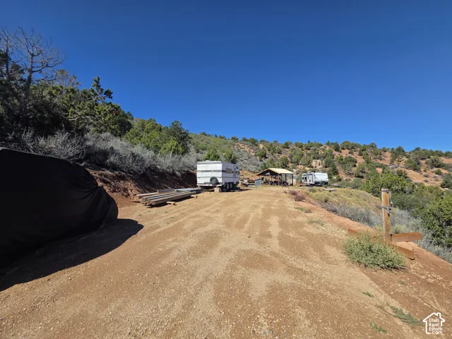 Nice flat areas excavated with road base for camping or building!