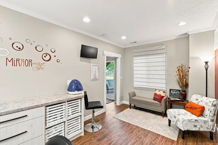 Hardwood-finish flooring, recessed lighting, and crown molding