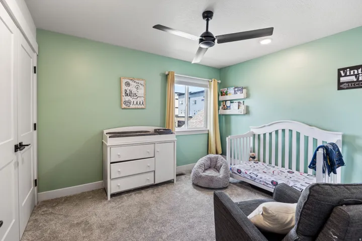 Recessed lighting, ceiling fan with light, and carpeted flooring