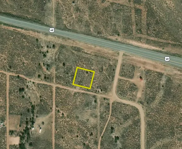 Aerial Map. Outlining the property in yellow with surrounding roads and terrain