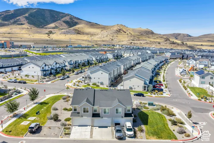 Aerial perspective showcasing the residential development with mountain scenery