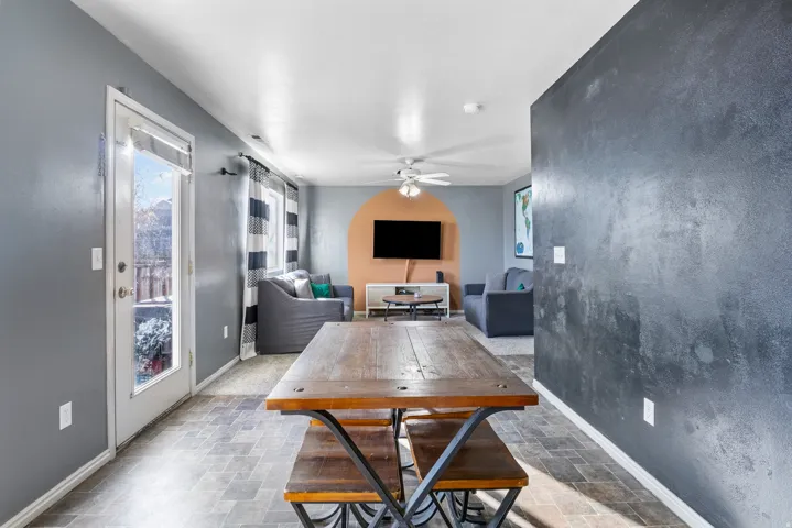 Wood-finish flooring extending through the space