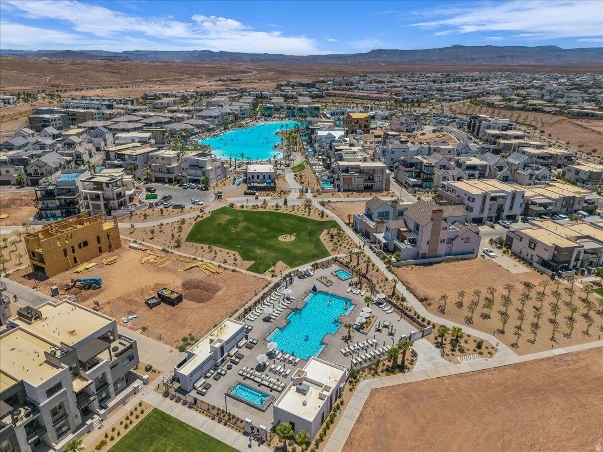 Community with a large central lagoon and multiple residential structures