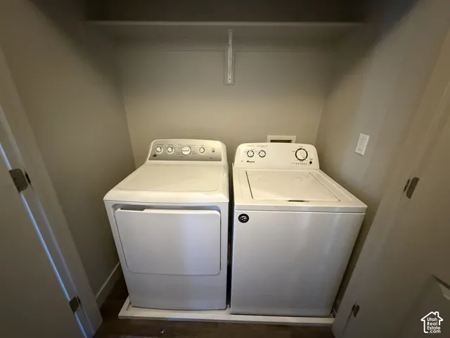 Integrated laundry area with a top-load washer and front-load dryer
