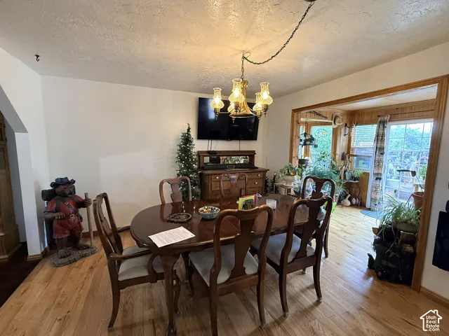 Wood-finish flooring throughout the space