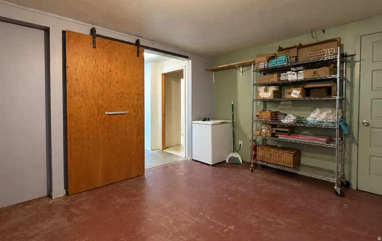 Basement area with finished walls and ceilings - just needs new flooring