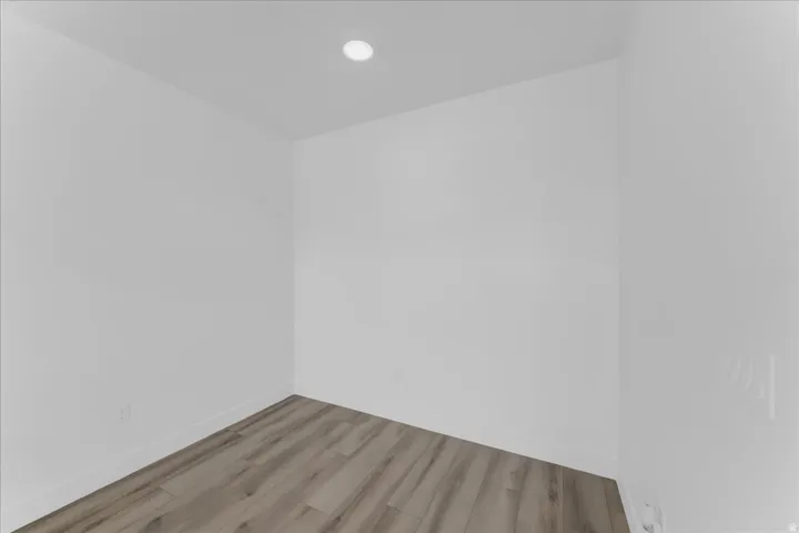 Recessed lighting with wood-finish flooring