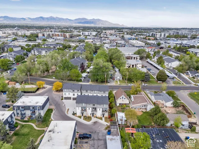 Townhome-style residences with attached garages and paved driveways
