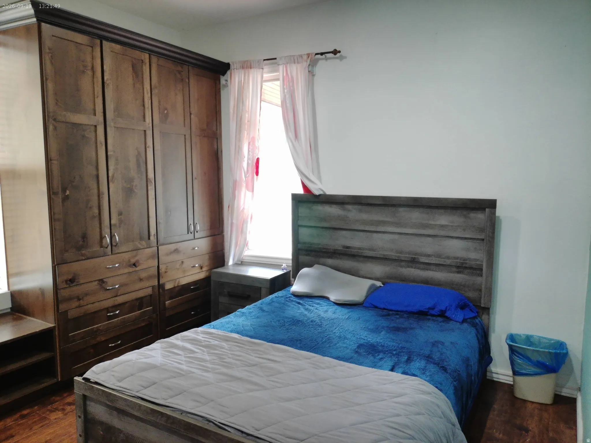 Built-in wood-finish cabinetry and drawers provide storage