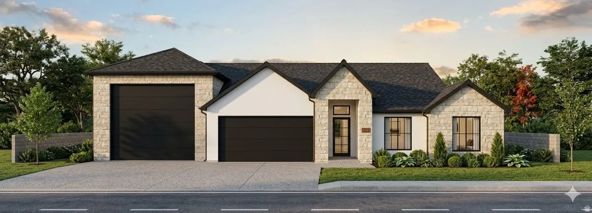 Stone and stucco exterior with dark shingle roofing