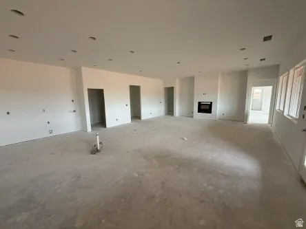 Recessed ceiling lighting, multiple entryways, and an integrated fireplace