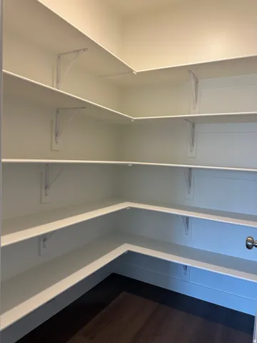 Built-in shelving with white finishes