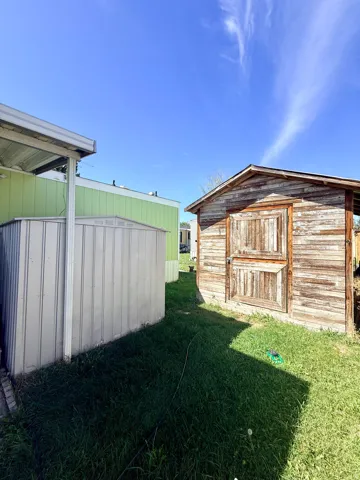 Both sheds included