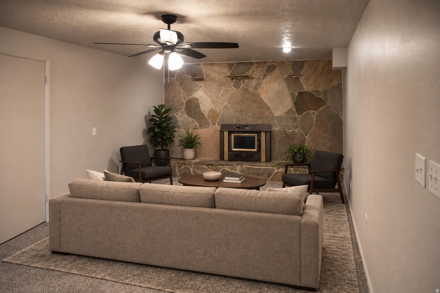 Stone accent wall with built-in fireplace