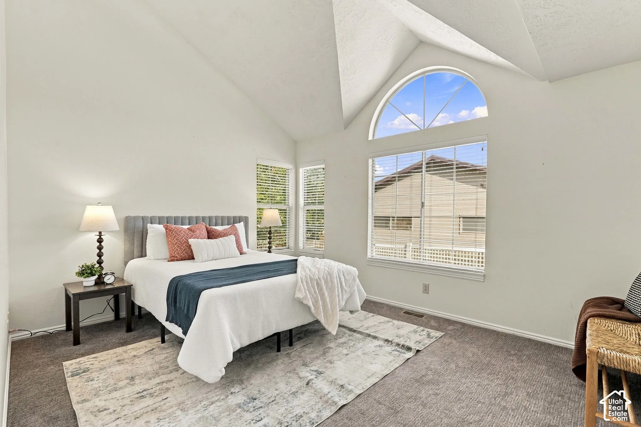 Vaulted ceiling with an arched transom window