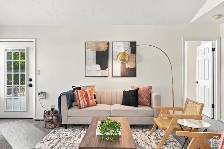 Light-colored carpeting throughout the space