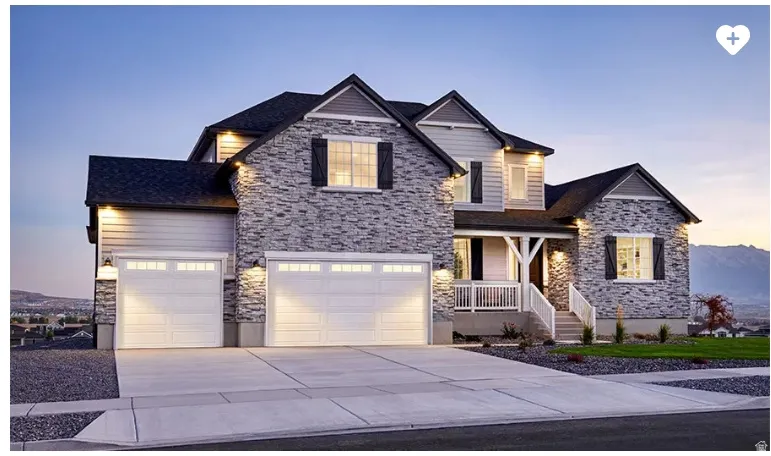 Stone and siding exterior with dark-shingle roofing
