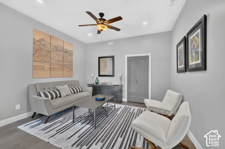 Recessed lighting, ceiling fan, bi-fold closet doors, and wood-finish flooring