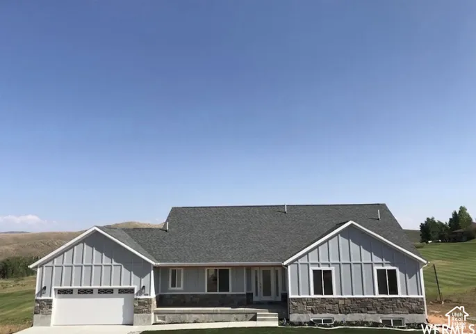 Light blue exterior siding with board and batten accents