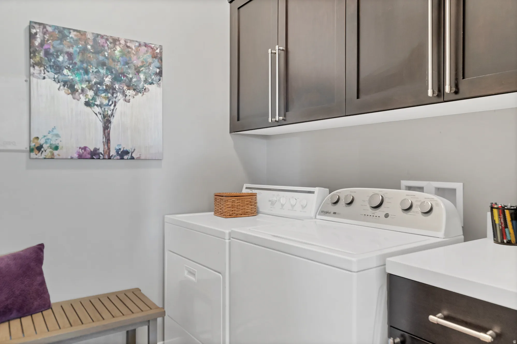 Upper cabinetry with brushed nickel hardware
