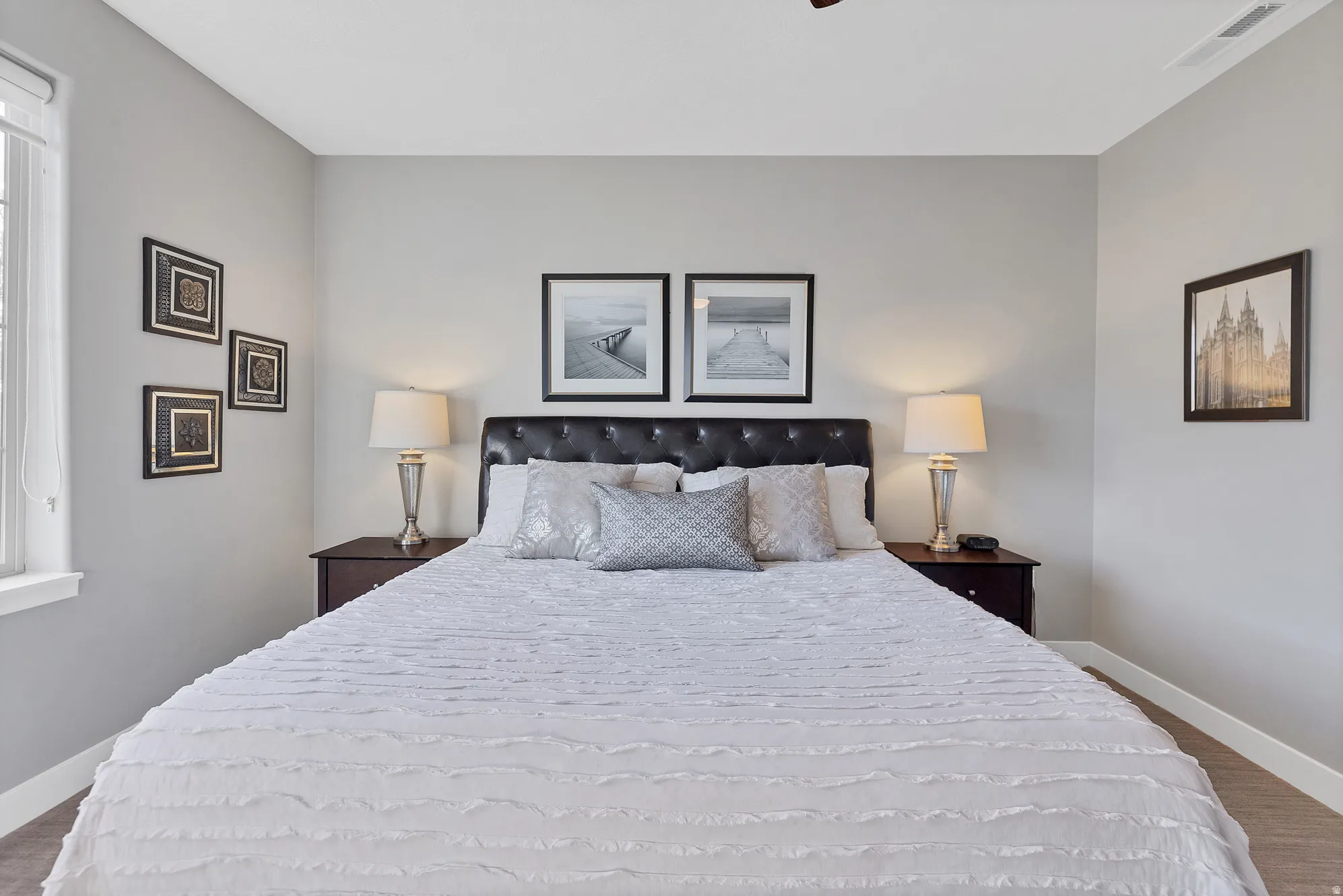 Light gray wall paint, white trim, and a window with white casing