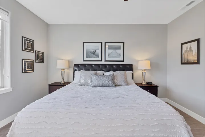 Light gray wall paint, white trim, and a window with white casing