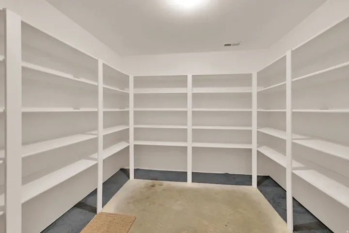 Extensive built-in shelving providing ample storage