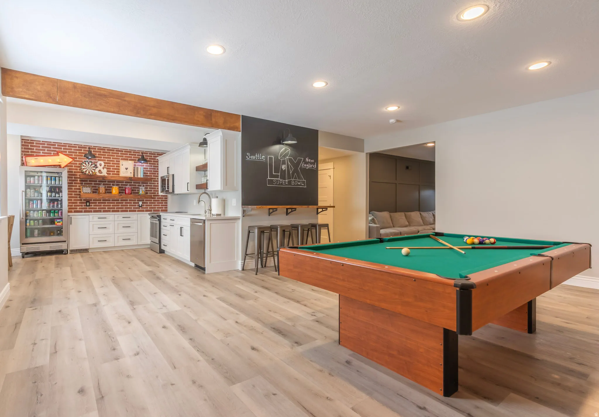 All NEW LVP flooring in kitchen & game room