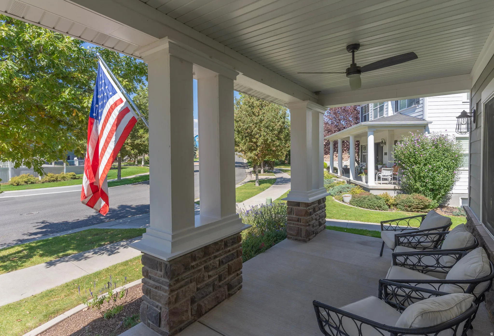 Deep, wide, covered porch w/columns