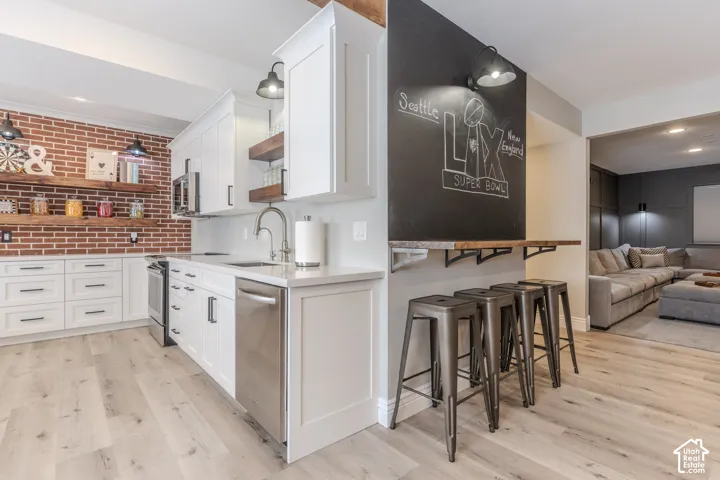 Lower level kitchen, bar, theatre