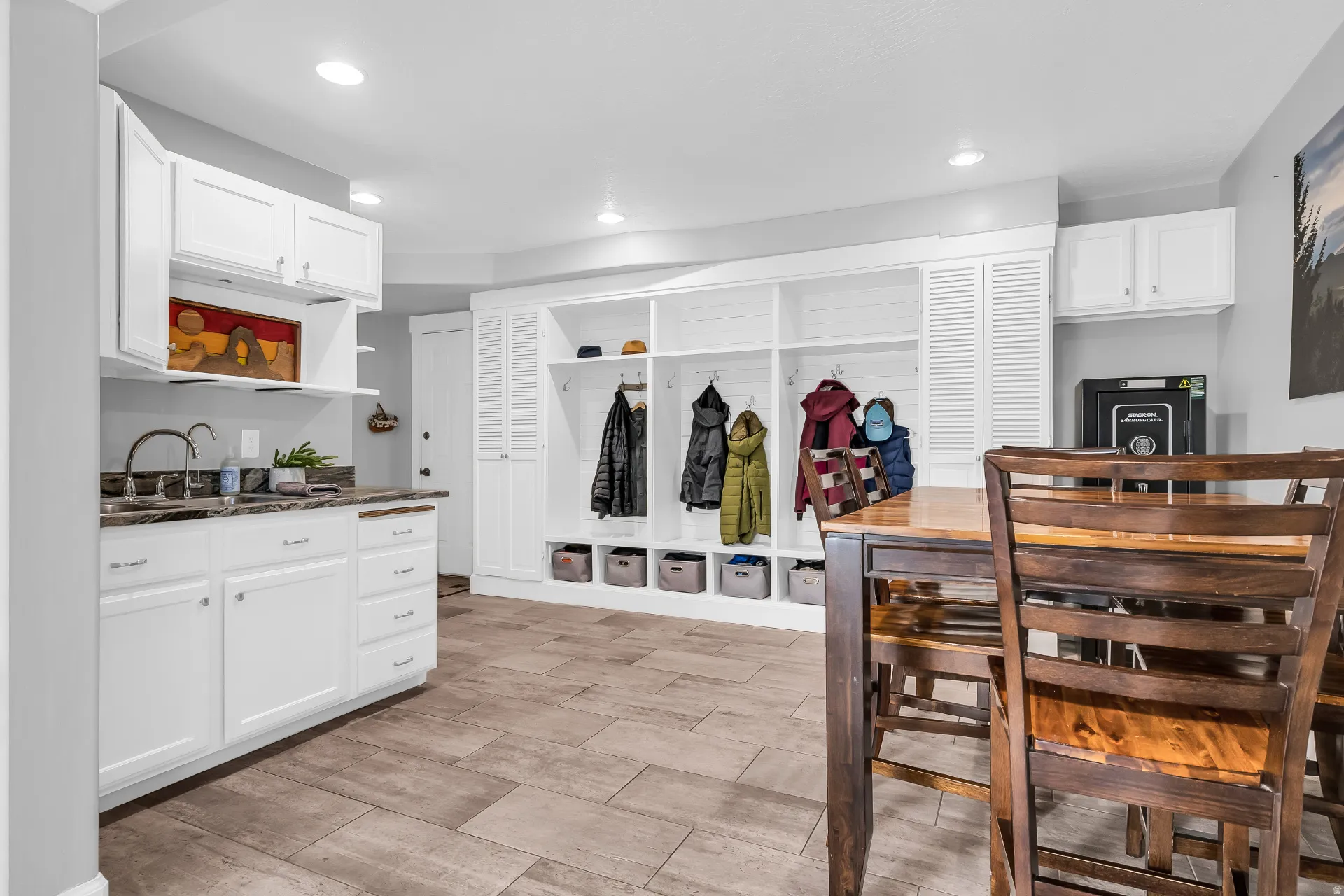 Wet/bar and open mudroom area, with built-in storage, lower level