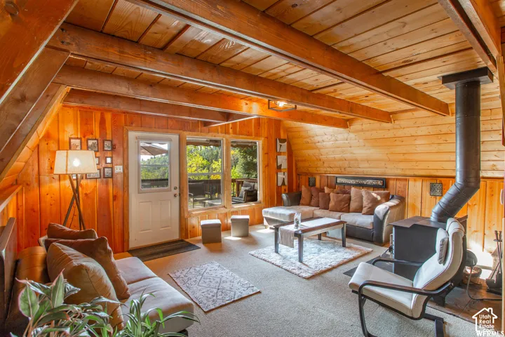 Wood-paneled walls and ceiling with exposed beams