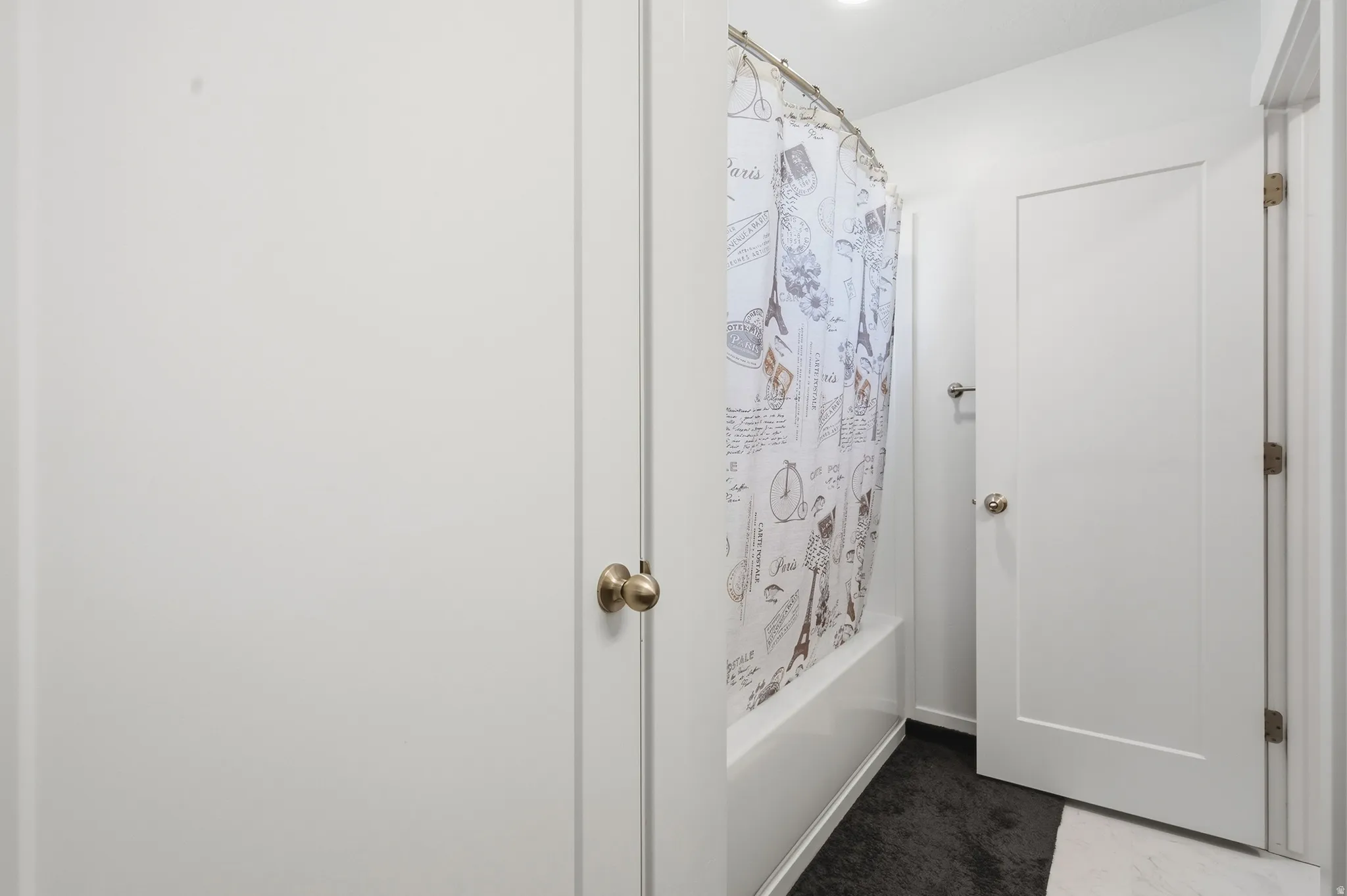 White interior doors with brass-finish hardware