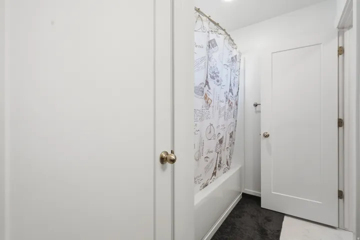 White interior doors with brass-finish hardware