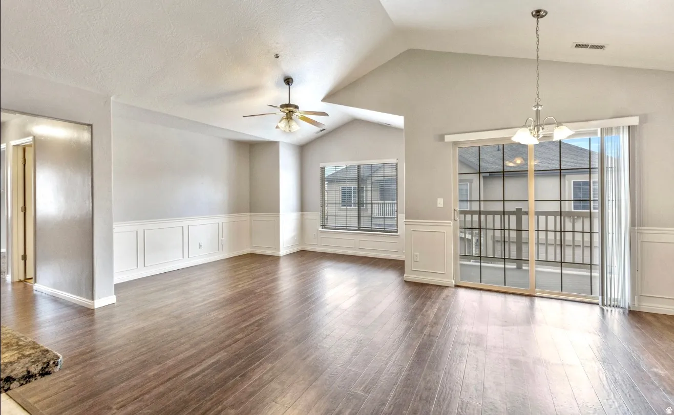 Vaulted ceilings complement the wood-finish flooring