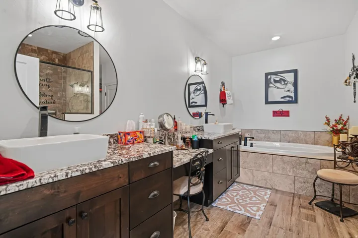 Dual vessel sinks with wall-mounted faucets
