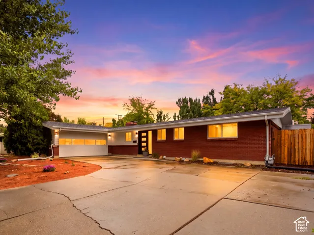 Red brick facade with white siding accents